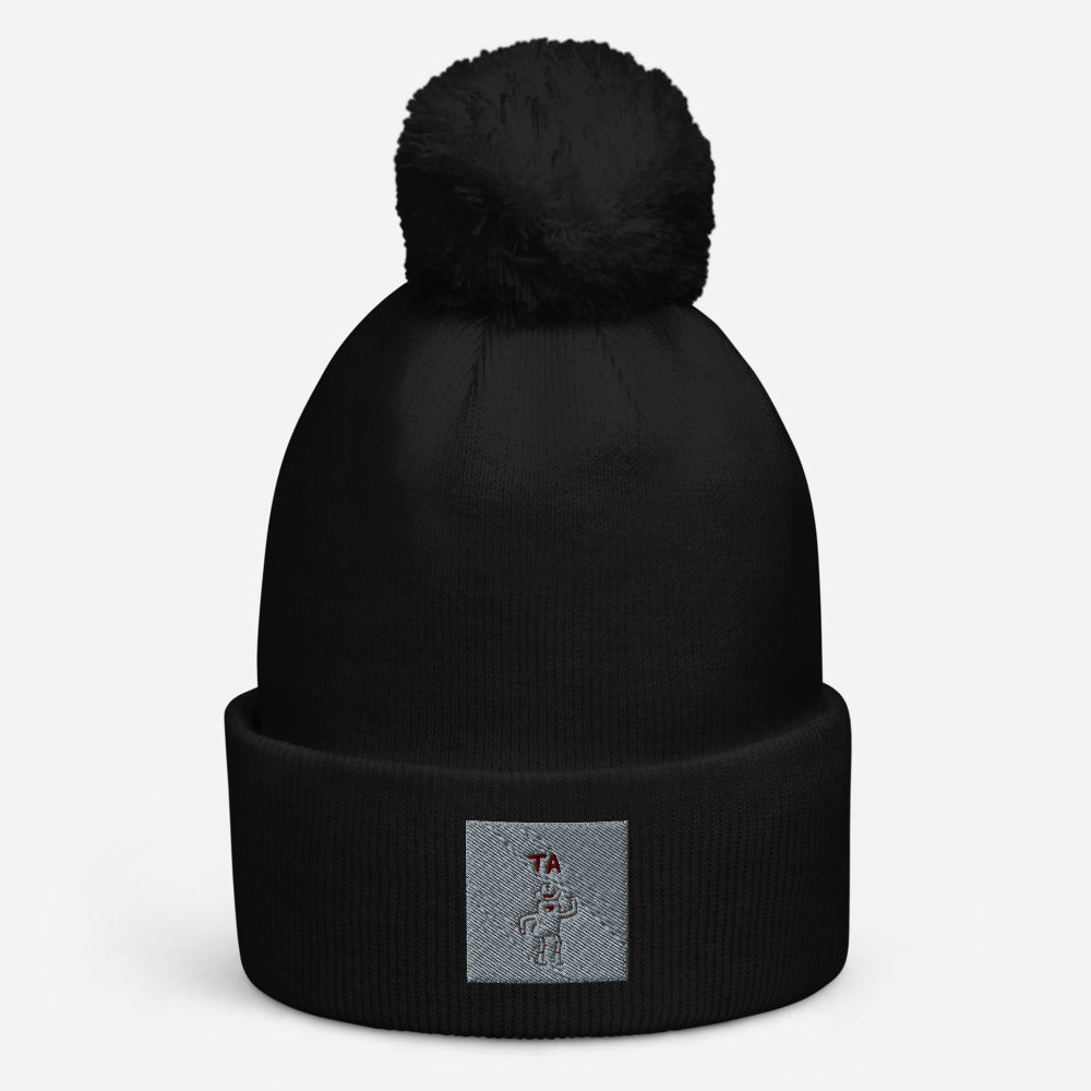 Pom pom beanie with custom logo by Eli Palleschi